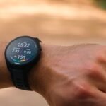 a man wearing Garmin Forerunner 165